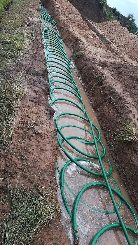 Slinky kolektor ve svahu